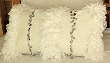 Cotton cushions and pompons