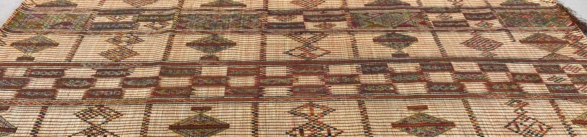 Mauritanian mats on Palm fibers and leather straps
